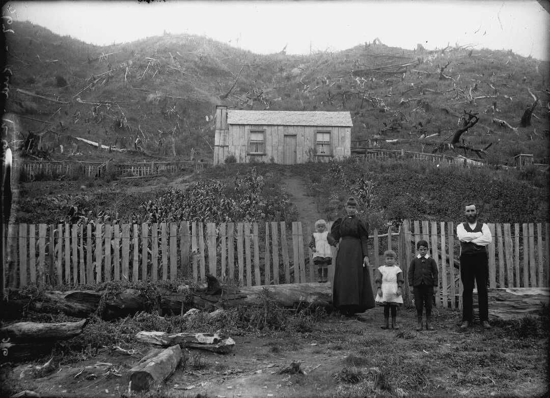 Reid Family Outside their Slab Hut Home Whangamomona